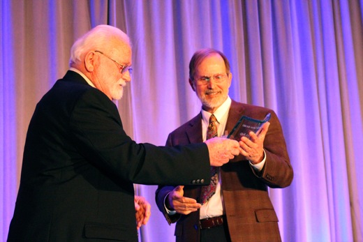 Dr. Karl Peace (on left) accepts the Sellers-McCroan Award, presented by Dr. Wade Sellers.